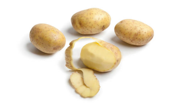 Plumber Surprise AZ | Unpeeled potatoes & a peeled potato | Pridemark Plumbing